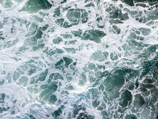 The ocean whitewater from above