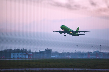 passenger plane begins to climb after takeoff