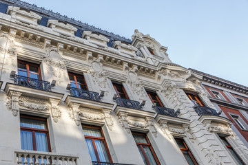 Facade of a large classical building, typical of the center of Madrid