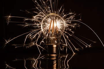 Fireworks sparkler showing through LED light bulb