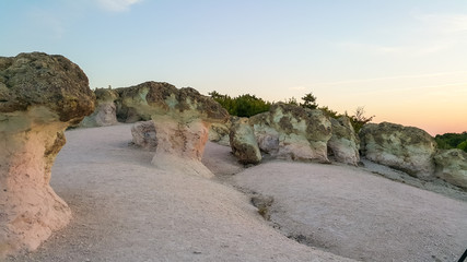 Fototapeta na wymiar Sunrise view of Rock formation Stone Mushrooms near Beli plast village, Kardzhali Region, Bulgaria
