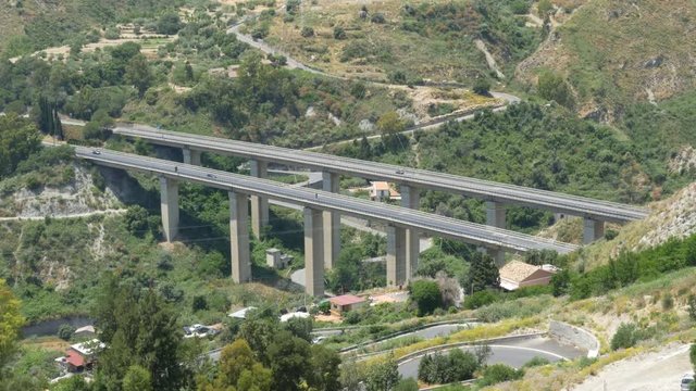 Elevated highway bridge. Autostrada A18 or European road E45 that runs through Taormina, Sicily, Italy.