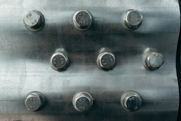Background metal texture with rivets.
