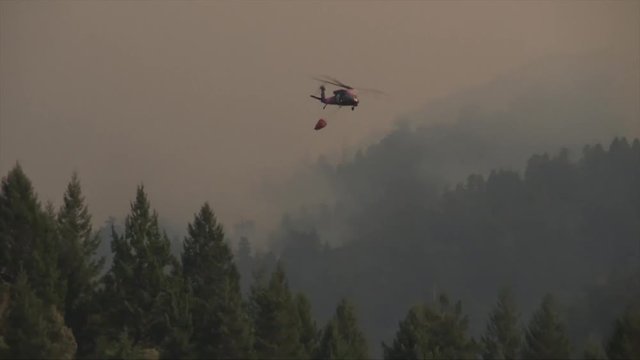 Military Helicopter Being Used To Fight Forest Fires In California