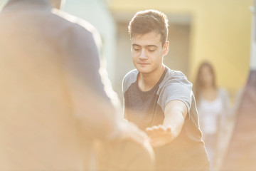 Teenager playing basketball
