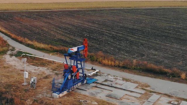 Pump Oil Jack in Field aerial drone view