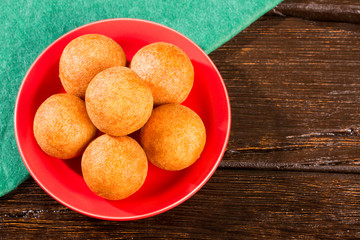 Traditional Colombian bunuelo - Deep Fried Cheese Bread.