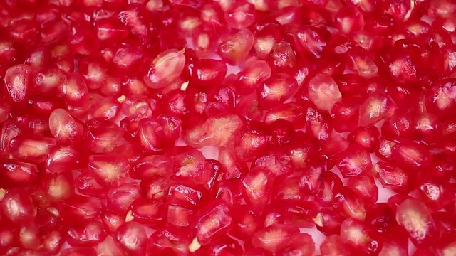 Pomegranate seeds red seed pomegranates looping texture pattern closeup video
