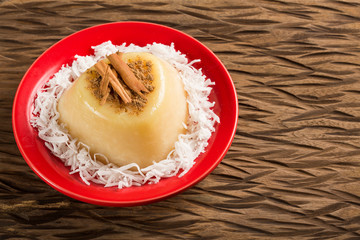 Natilla traditional Colombian food - Christmas atmosphere - Wood background