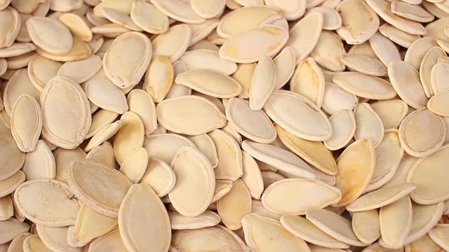 Pumpkin seeds seed looping texture pattern closeup video