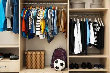 Fototapeta premium Large wardrobe with teenager clothes, shoes and accessories