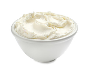 Bowl of tasty cream cheese on white background