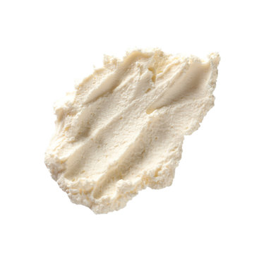 Fototapeta Smear of tasty cream cheese on white background, top view