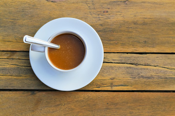 cup of coffee on the wooden table