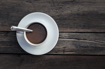 cup of coffee on the wooden table