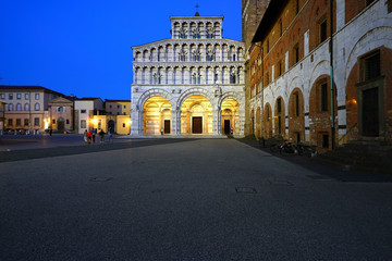 Fototapeta na wymiar View of the landmark Renaissance Lucca Cathedral (Duomo di Lucca, Cattedrale di San Martino), a Roman Catholic cathedral in Lucca, a historic city in Tuscany, Central Italy