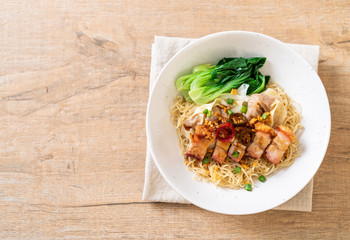 egg noodle soup with crispy pork belly and wonton