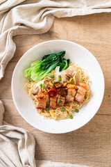 egg noodle soup with crispy pork belly and wonton