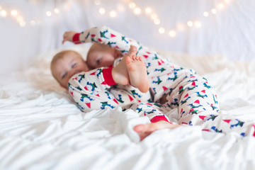 Brothers Snuggling In Pajamas