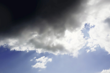 Fototapeta premium Artistic Dramatic atmosphere panorama view of soft white and storm clouds with powerful sunlight from the summer sky.