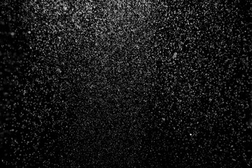 Falling Snow down On The Black Background