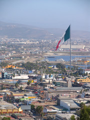 Giant Mexican Flag flying over the city of Ensenada, Mexico