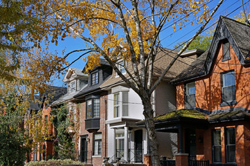 row of old Victorian houses with gables