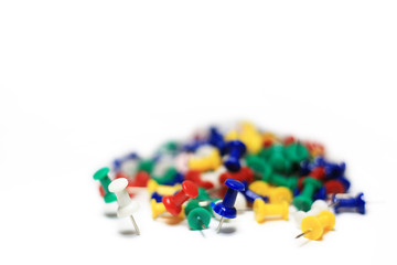 Colorful pushpins isolated in white background. Office accessories with copy space.