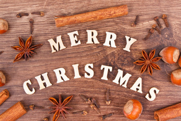 Inscription Merry Christmas and ingredients for baking