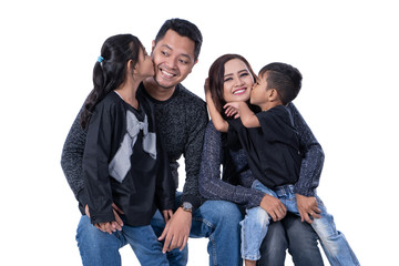 asian happy family smiling to camera 