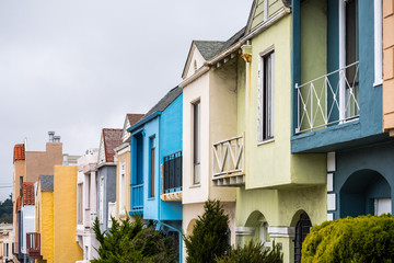 Fototapeta na wymiar Street view of rows of houses in one of the San Francisco's residential neighborhoods, California