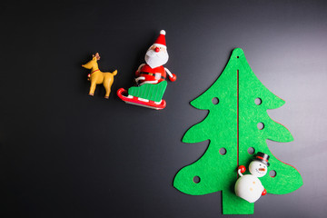 Christmas decorations on black background with copy space.Christmas day concept.