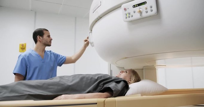 Examination of Patient Using MRI Magnetic Resonance Imaging Machine Hospital
