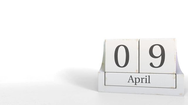 Cube calendar shows April 9 date. 3D animation
