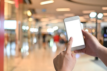 Mockup smartphone mobile on hands with touch on display clipping path.