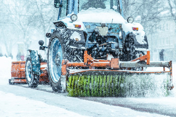 snowplow close up cleaning street of snow
