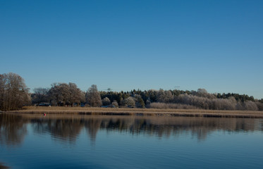 Fototapeta na wymiar Cold frosty day at the lake Malaren by boat in Stockholm