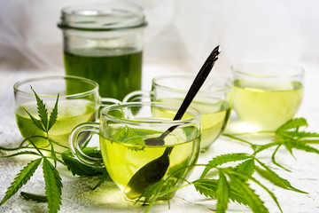 Cannabis herbal tea served in glass teacups