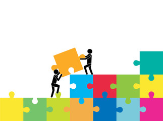 Kooperation. Collaboration.Business people pushing and assembling  jigsaw puzzle.