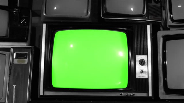 80s TV Green Screen with Many 80s TVs. Dolly Out Fast. Noir Tone. You can replace green screen with the footage or picture you want with “Keying” effect in AE  (check out tutorials on YouTube).