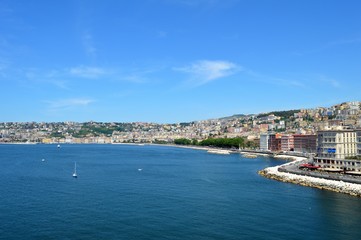 Naklejka na ściany i meble An image of cityscape and sea of the city of Naples, in Italy