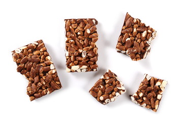 Chocolate with rice bars isolated on white background, top view