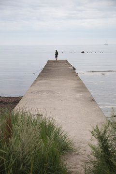 Man on wharf in Sweden
