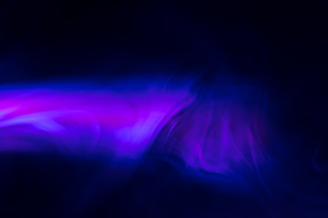 purple, blue, pink smoke (evaporation) on a black background