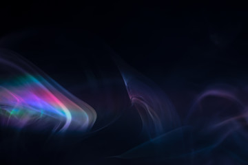 purple, blue, pink smoke (evaporation) on a black background