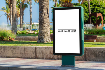 Outdoor billboard advertisement in seaside resort city mockup © sdecoret