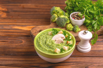 Fresh tasty pureed broccoli soup with vegetables. Healthy food