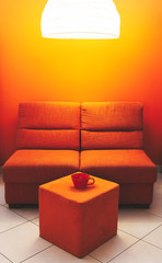 Orange sofa and cup matte