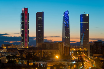 Madrid cityscape at night. Landscape of Madrid business building at Four Tower. Modern high building in business district area at Spain.