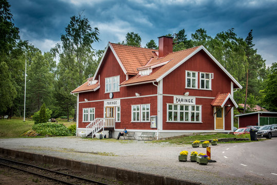 Red railway station in Faringe, Sweden